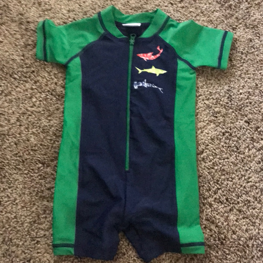 Never worn Boys rash guard swimsuit!